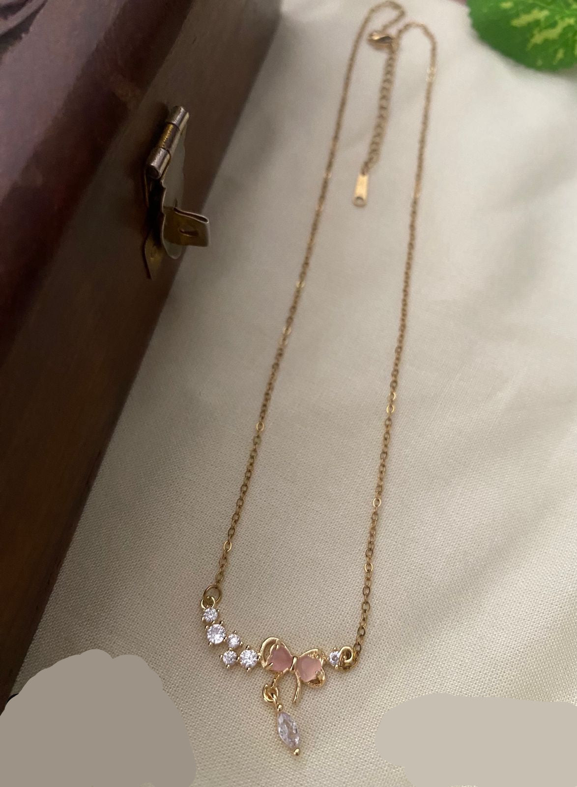 Golden Bow with Rose Hearts stones Anti Tarnish Pendant necklace
